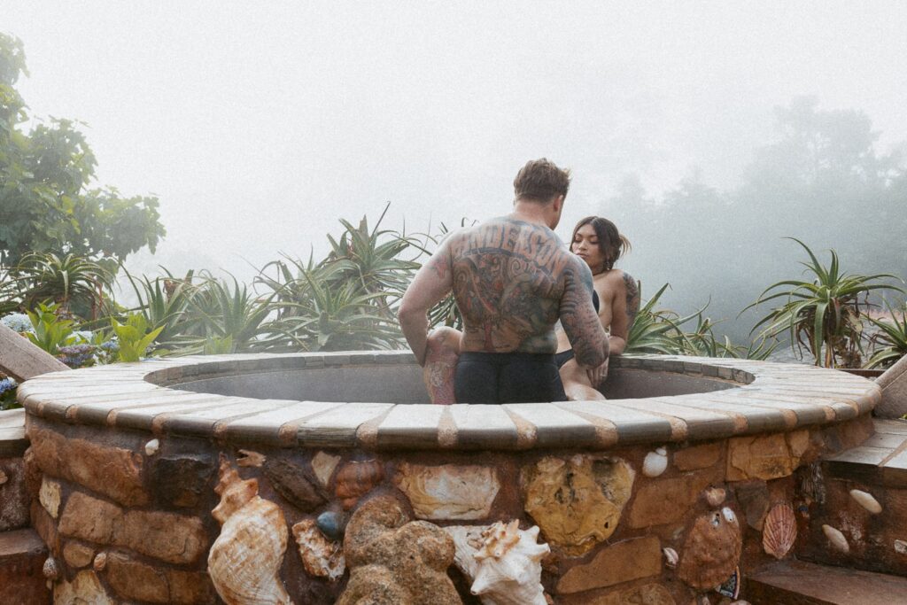 Man and woman in a hot tub. 