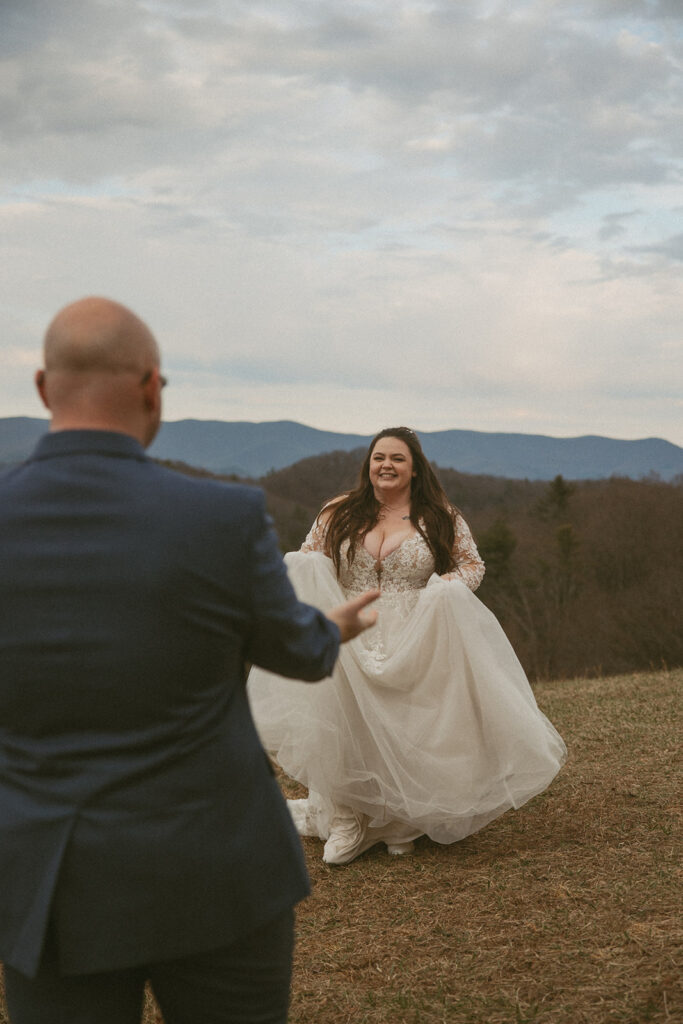 Man and woman in wedding attire in the north georgia mountains