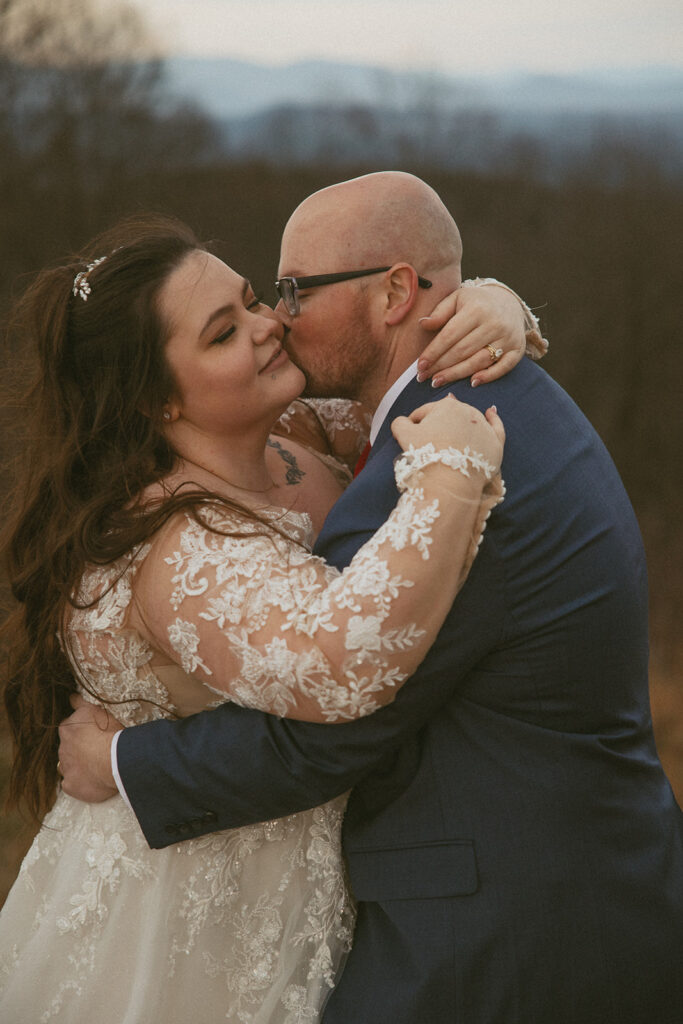 Man and woman in wedding attire in the north georgia mountains