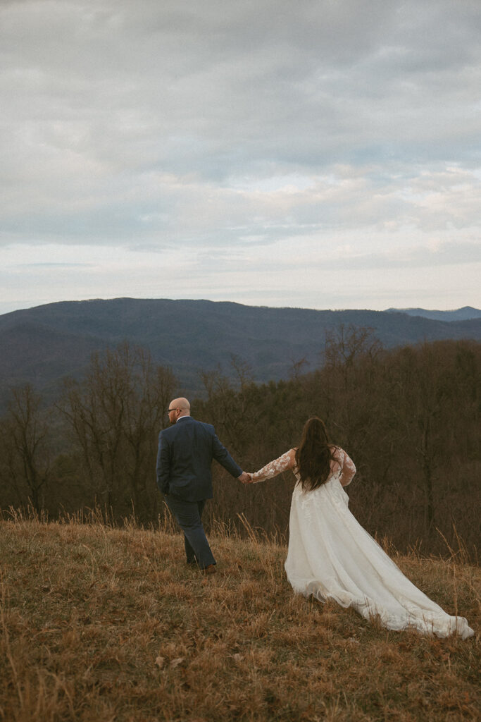 Man and woman in wedding attire in the north georgia mountains