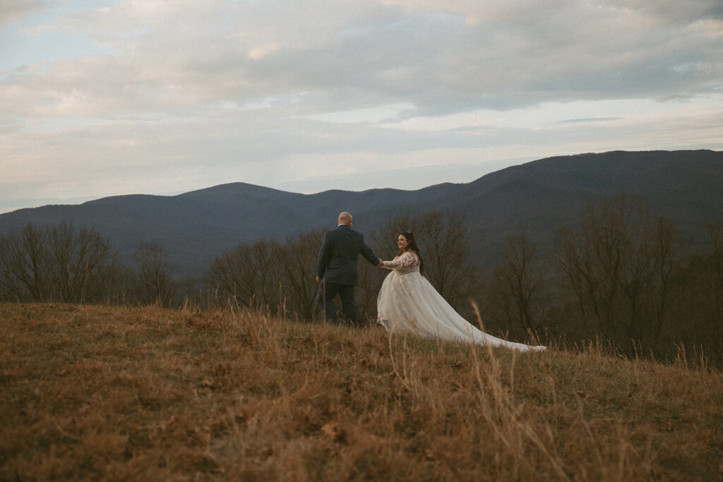 Man and woman in wedding attire in the north georgia mountains