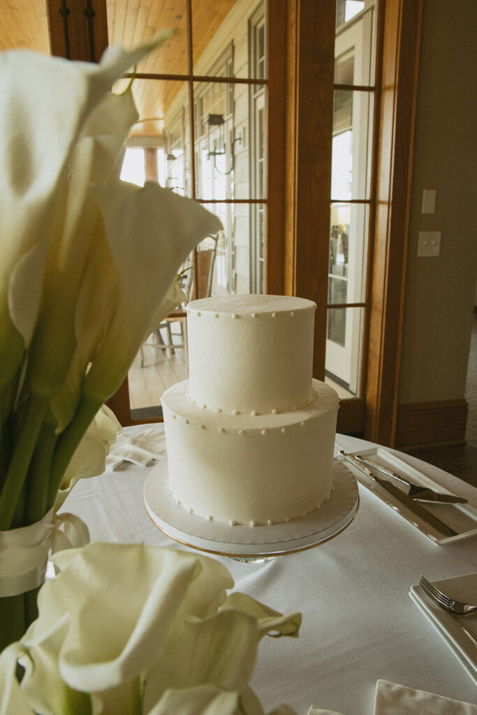a small simple two tier wedding cake at trillium links and lake club
