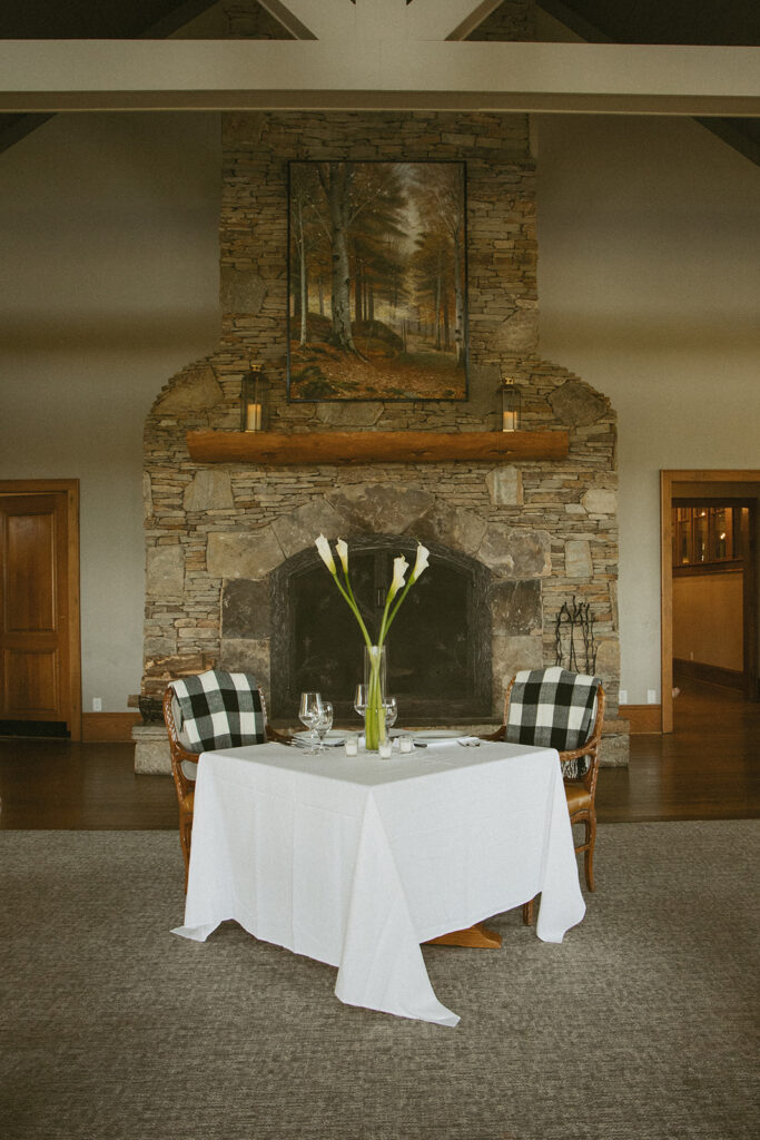 a sweetheart table set up at trillium links and lake club in cashiers nc