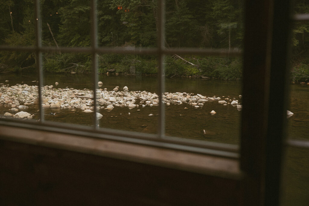 Wilson Creek through the lodge windows at Brown Mountain Beach Resort.