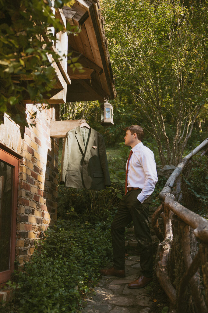 Candid getting ready moments with groom at Douglas Ellington House