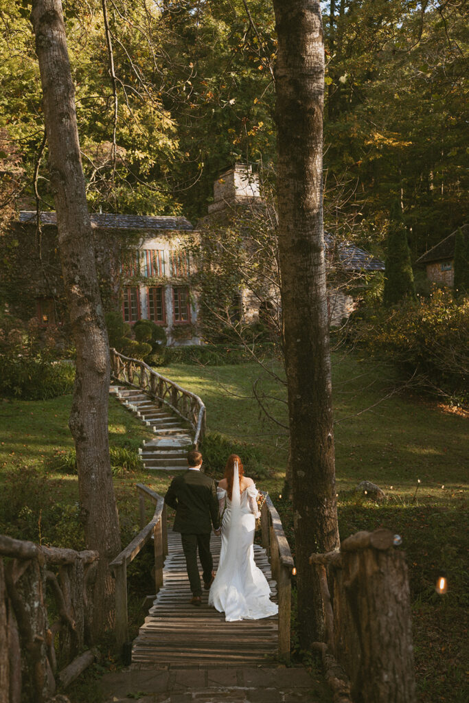 Bride and groom walking together on the property at Douglas Ellington House