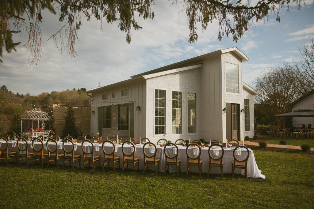 Outdoor gathering area on the Luxe Glass House property.