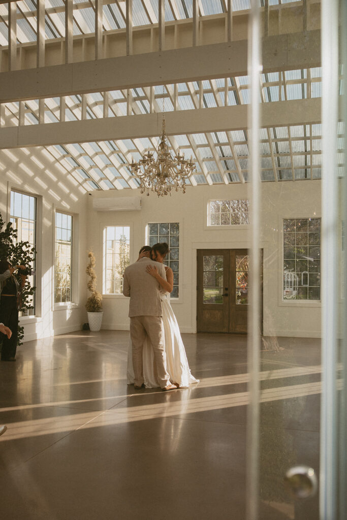 Natural light streaming through the glass walls at Luxe Glass House.