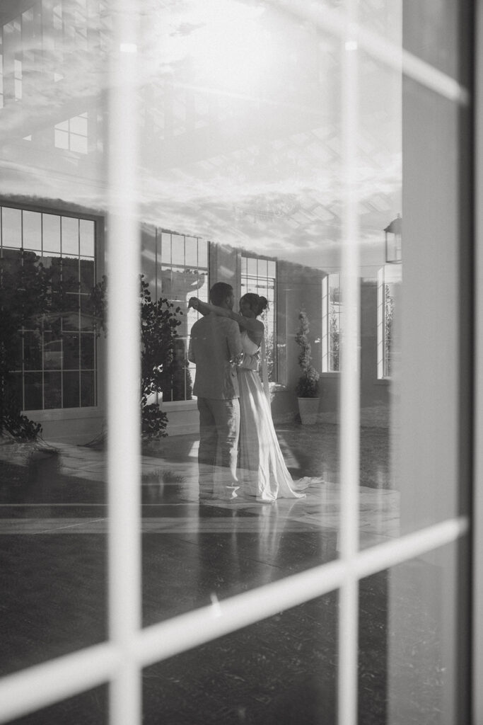 Natural light streaming through the glass walls at Luxe Glass House.